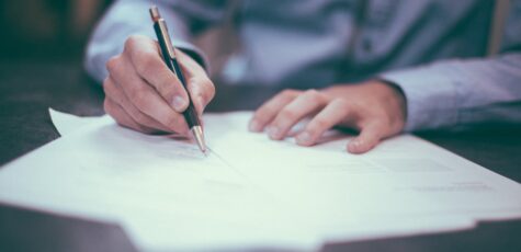 Man Sorting Pension Paperwork