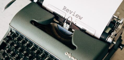 Typewriter typing out a pension review