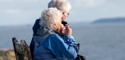 A retired couple pondering on the benefits and drawbacks of a flexi-access pension drawdown product.