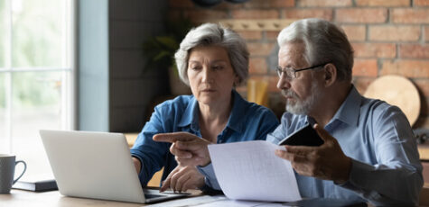 an image of a couple planning to safeguard their retirment